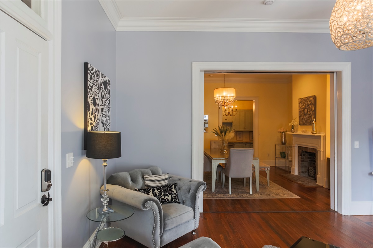 A welcoming living room that sets the tone for your stay in this restored Victorian.
