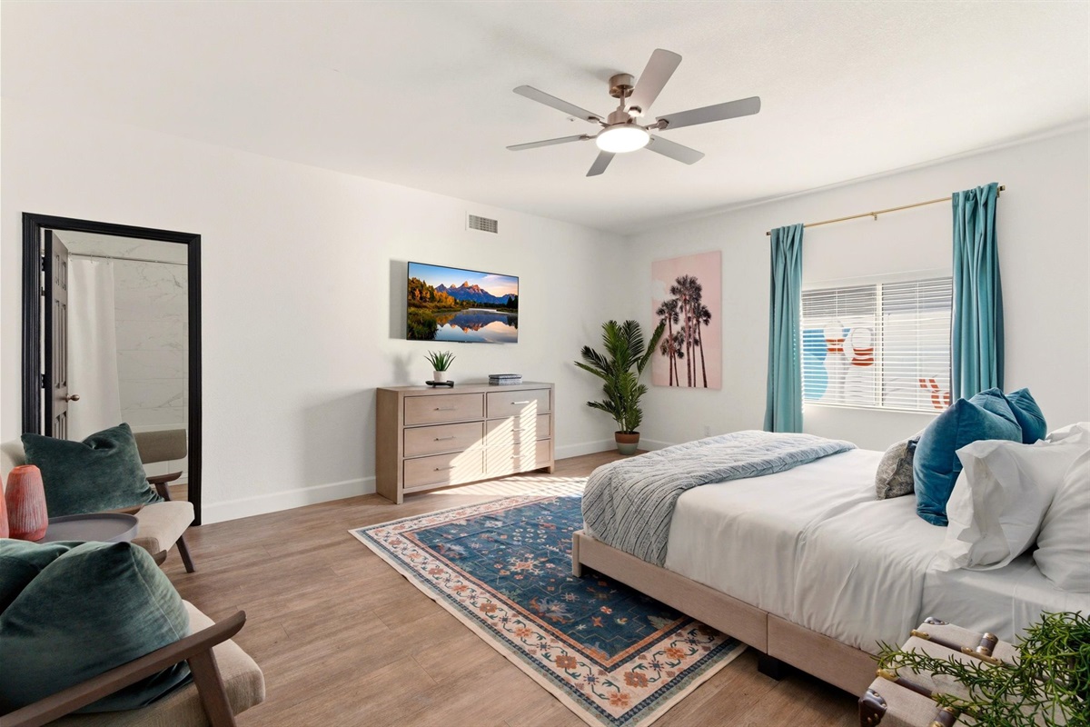55" TV & Ensuite; 2 reading chairs; dresser