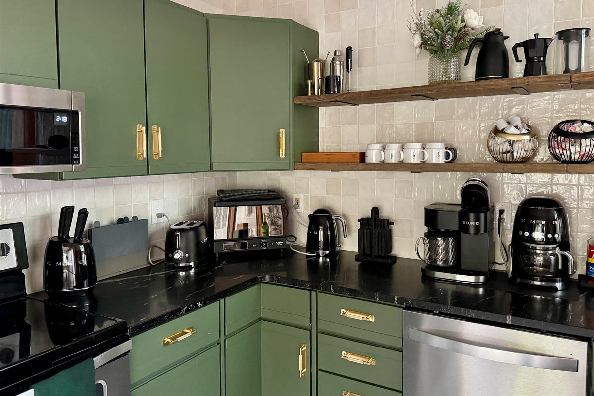 “Designer kitchen with Smeg appliances — where morning coffee becomes ritual.”