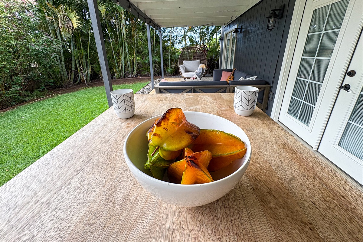 pick starfruit and limes from our trees