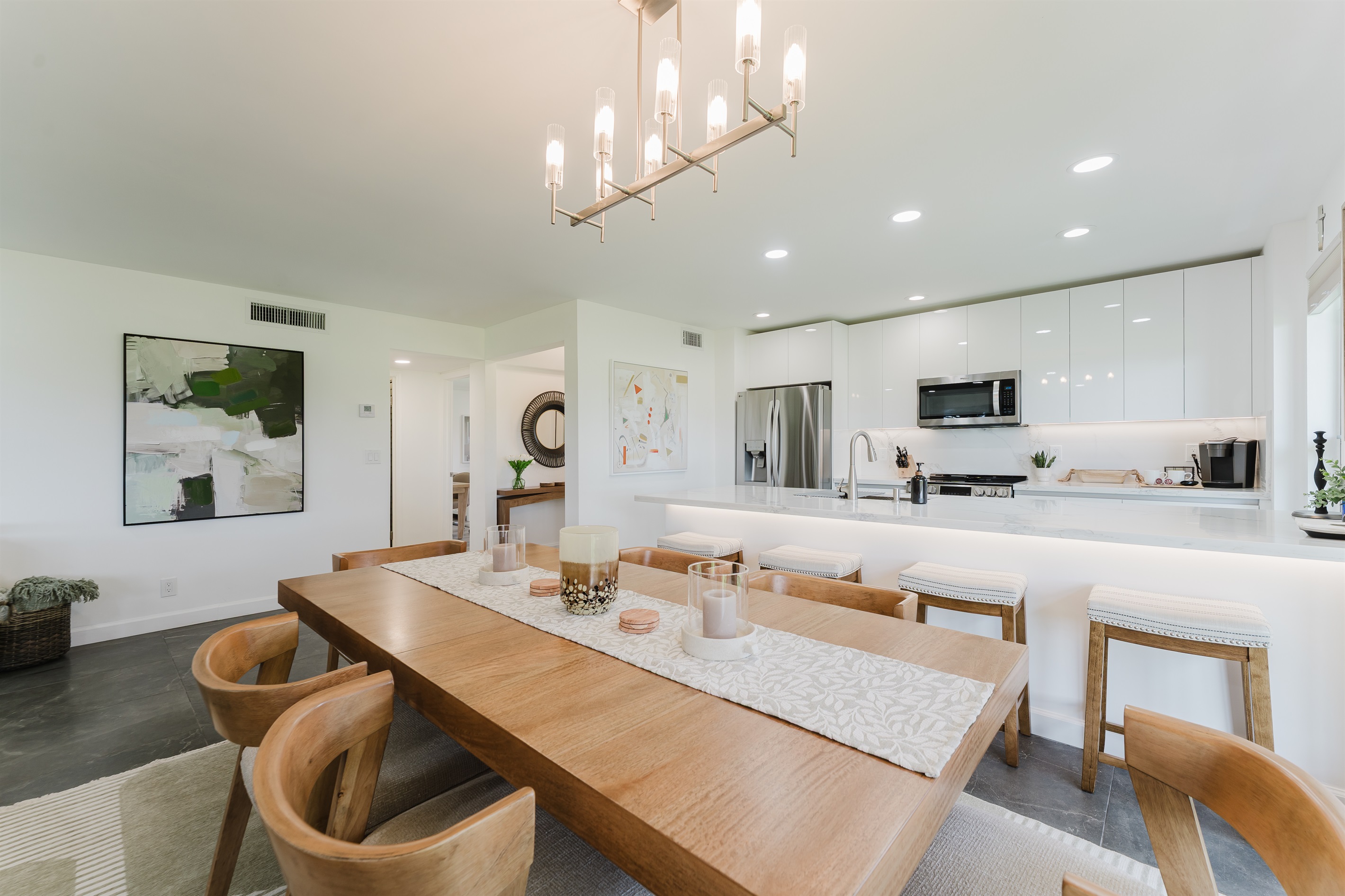 Open-concept dining area that connects seamlessly to the kitchen and living room. Ideal setup for gathering, dining, and creating lasting memories.