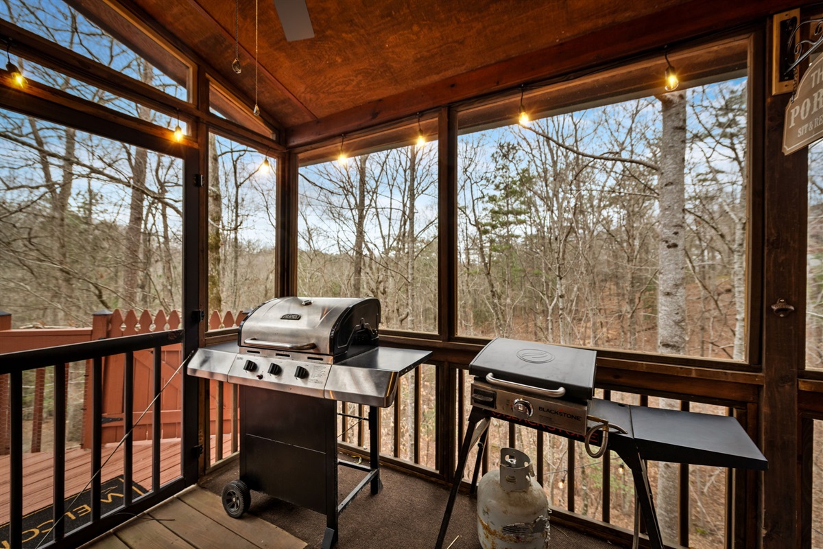 The cabin’s porch features a grill—perfect for relaxing and enjoying a sizzling meal outdoors.