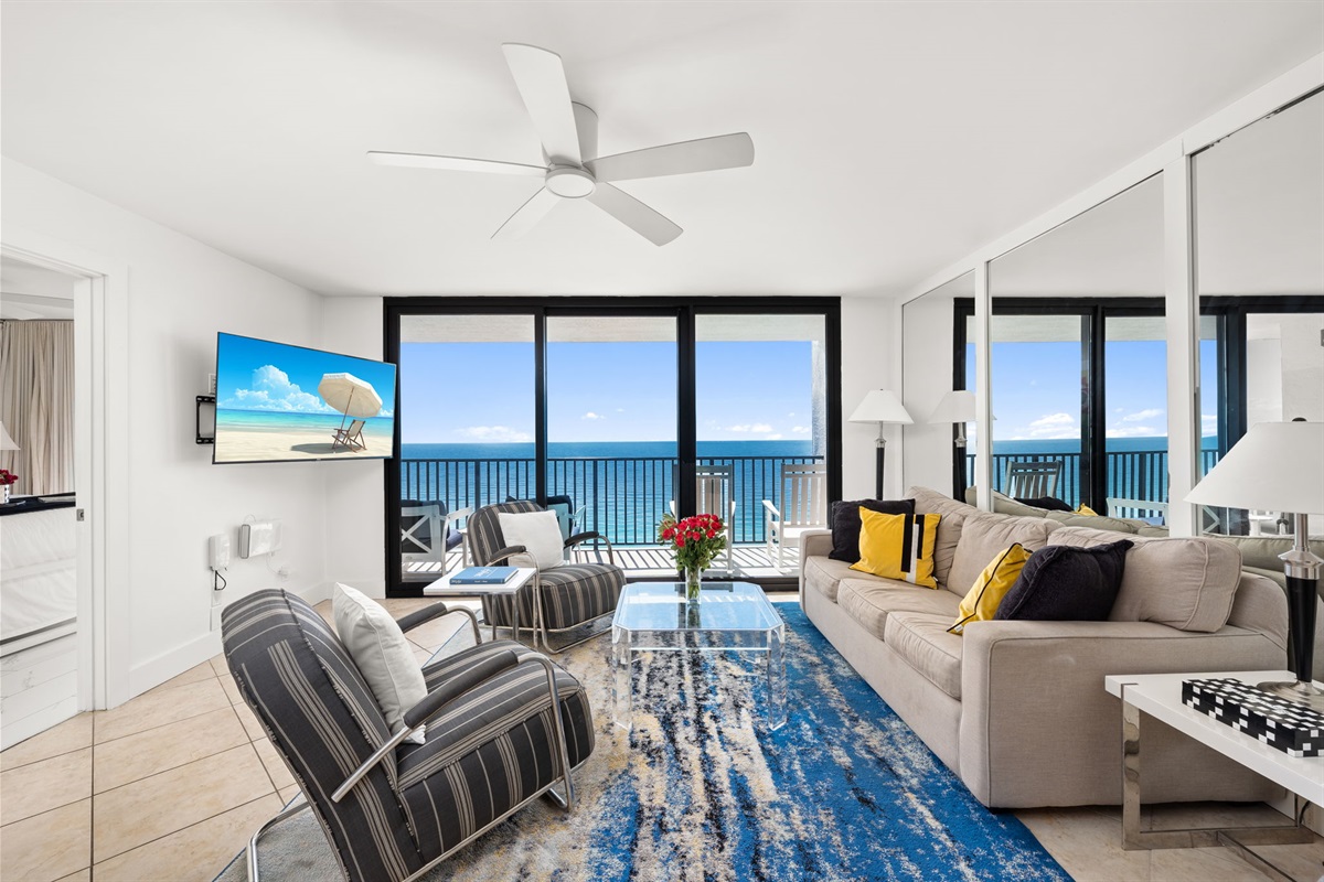 Relax, stretch out, and lose track of time. With floor-to-ceiling Gulf views, a comfortable sleeper sofa, and custom chairs perfectly positioned for the water, the ocean becomes part of your everyday living space.