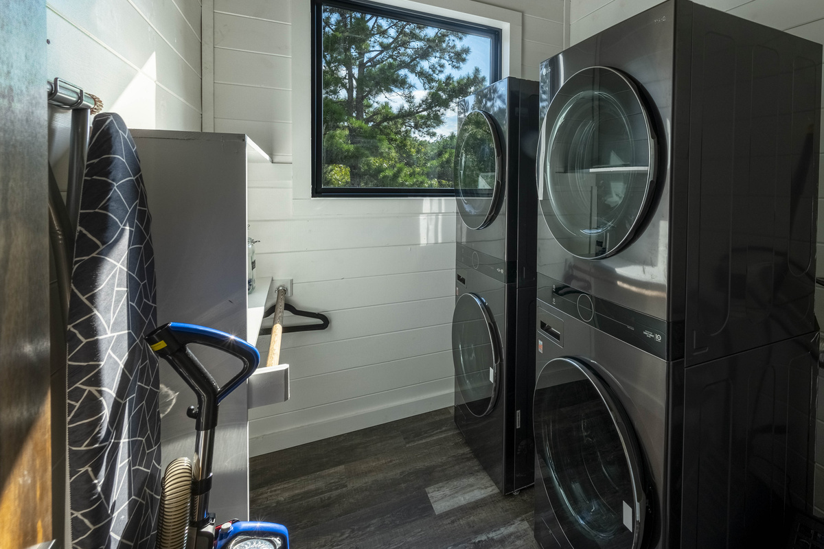 Equipped with double washer and dryers, making it easy to handle laundry during your stay. Ironing board and essential laundry amenities are also provided
