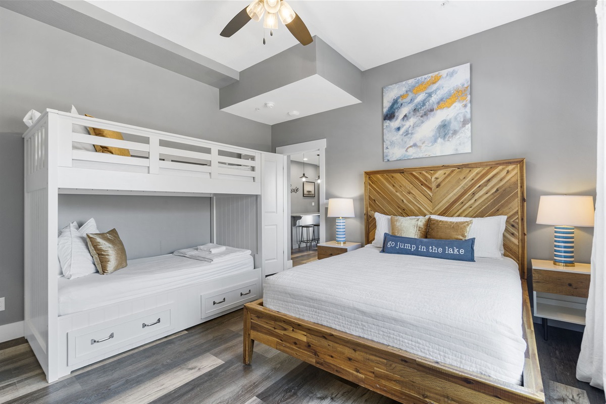 Lower level Queen w/ bunks with attached bathroom