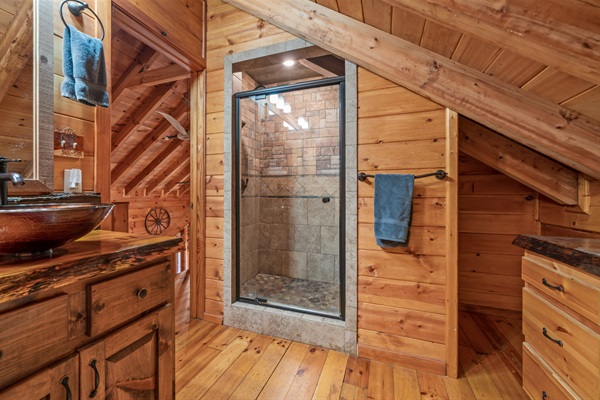 Shower in private loft bathroom