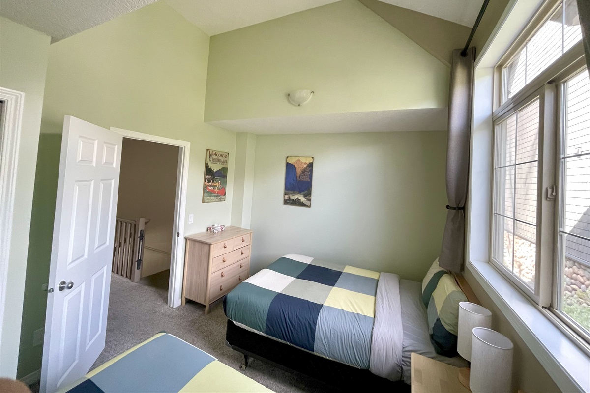 2nd bedroom.  Two double beds.  Adjacent bathroom in hallway.  Located on 2nd floor.