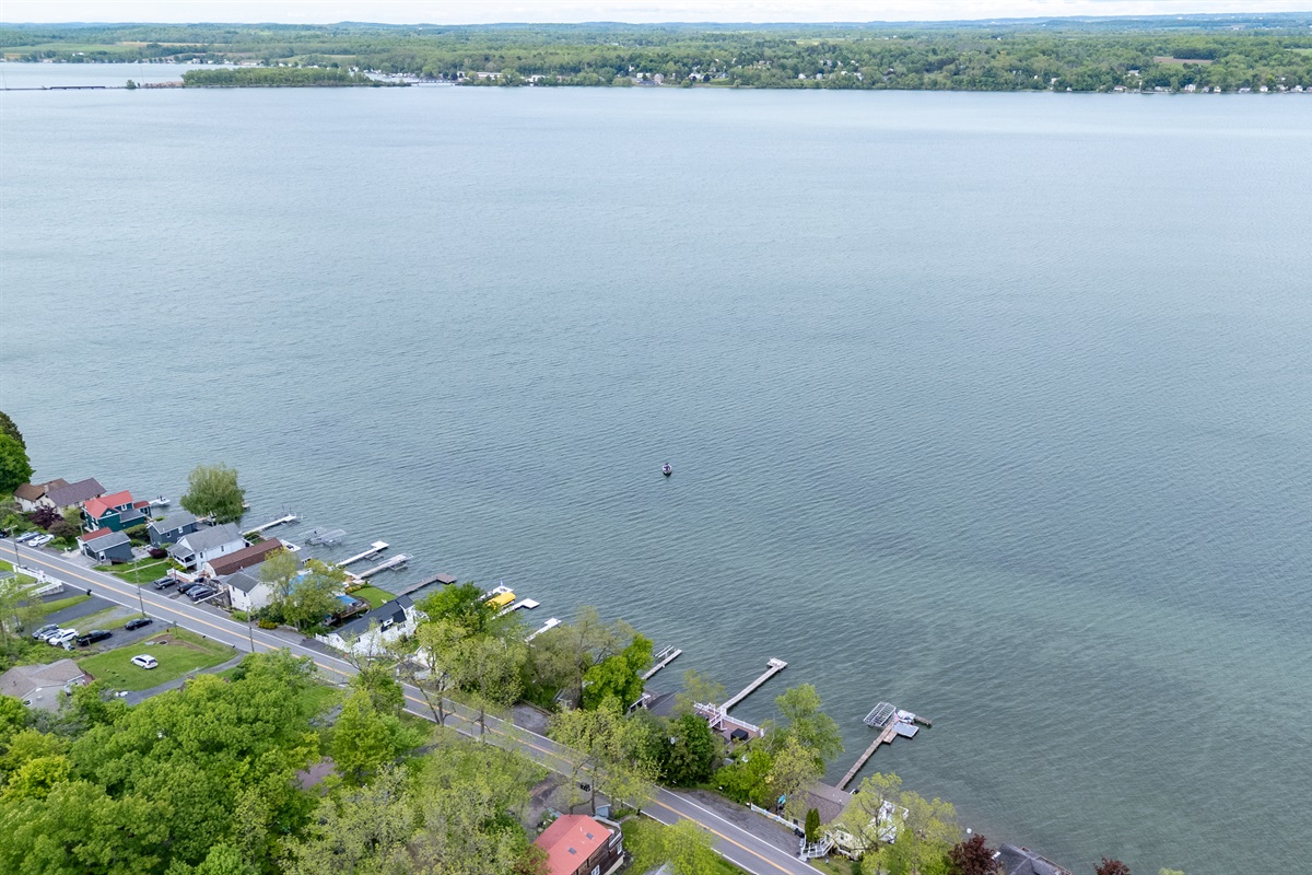 Nestled along a scenic shoreline, this cozy lakefront retreat sits in a charming and peaceful neighborhood 🌳🏘️✨