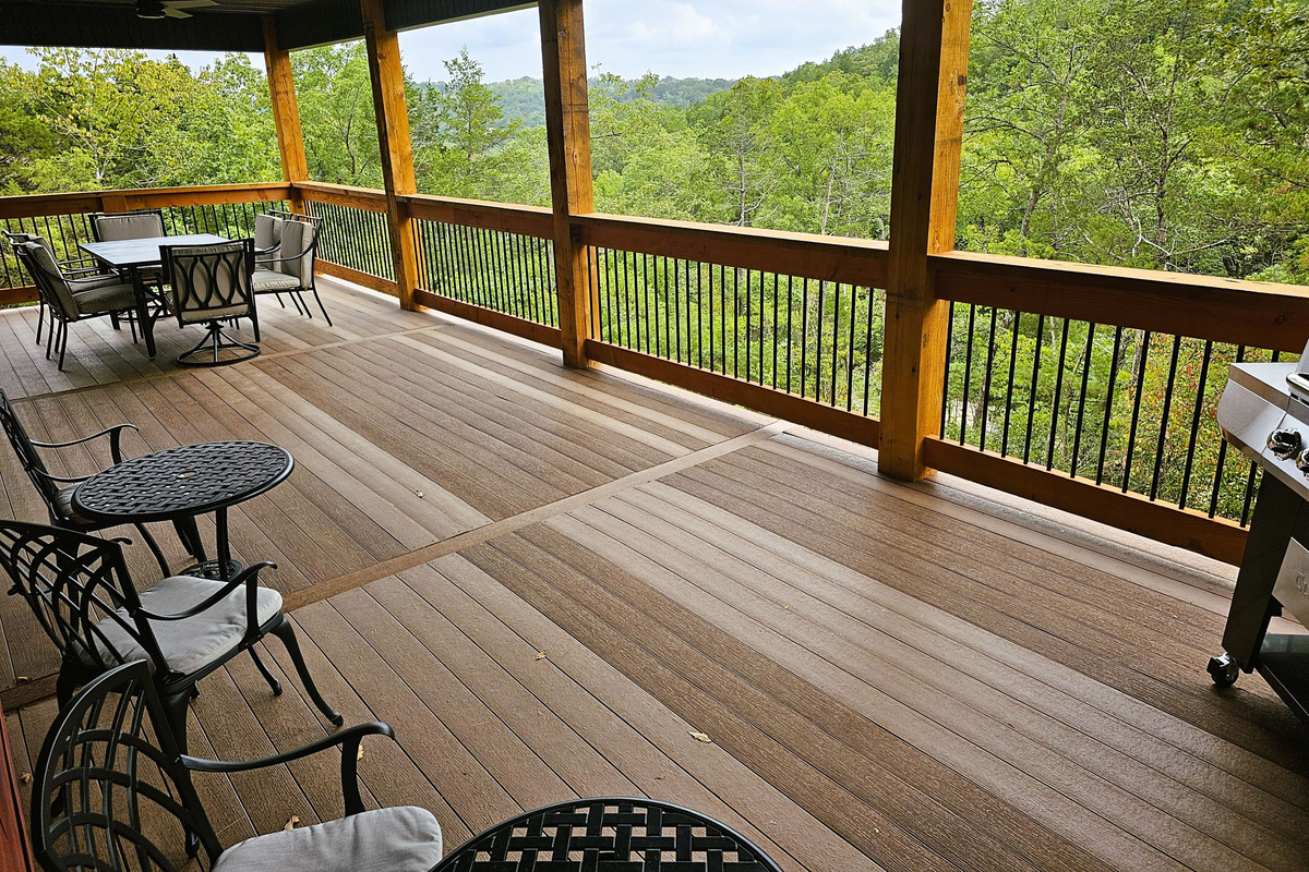 Take in peaceful wooded views from the expansive covered deck.
