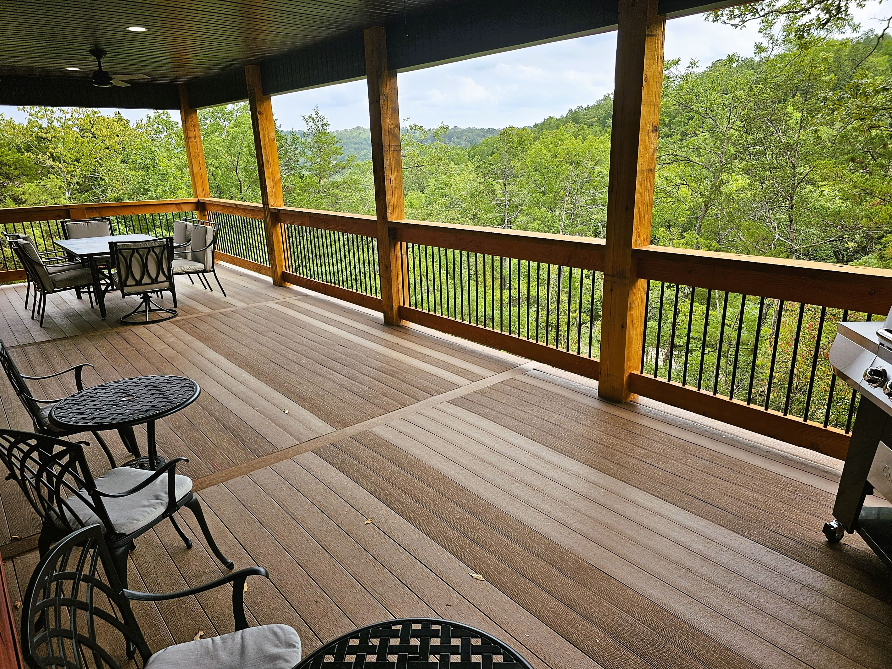 Take in peaceful wooded views from the expansive covered deck.
