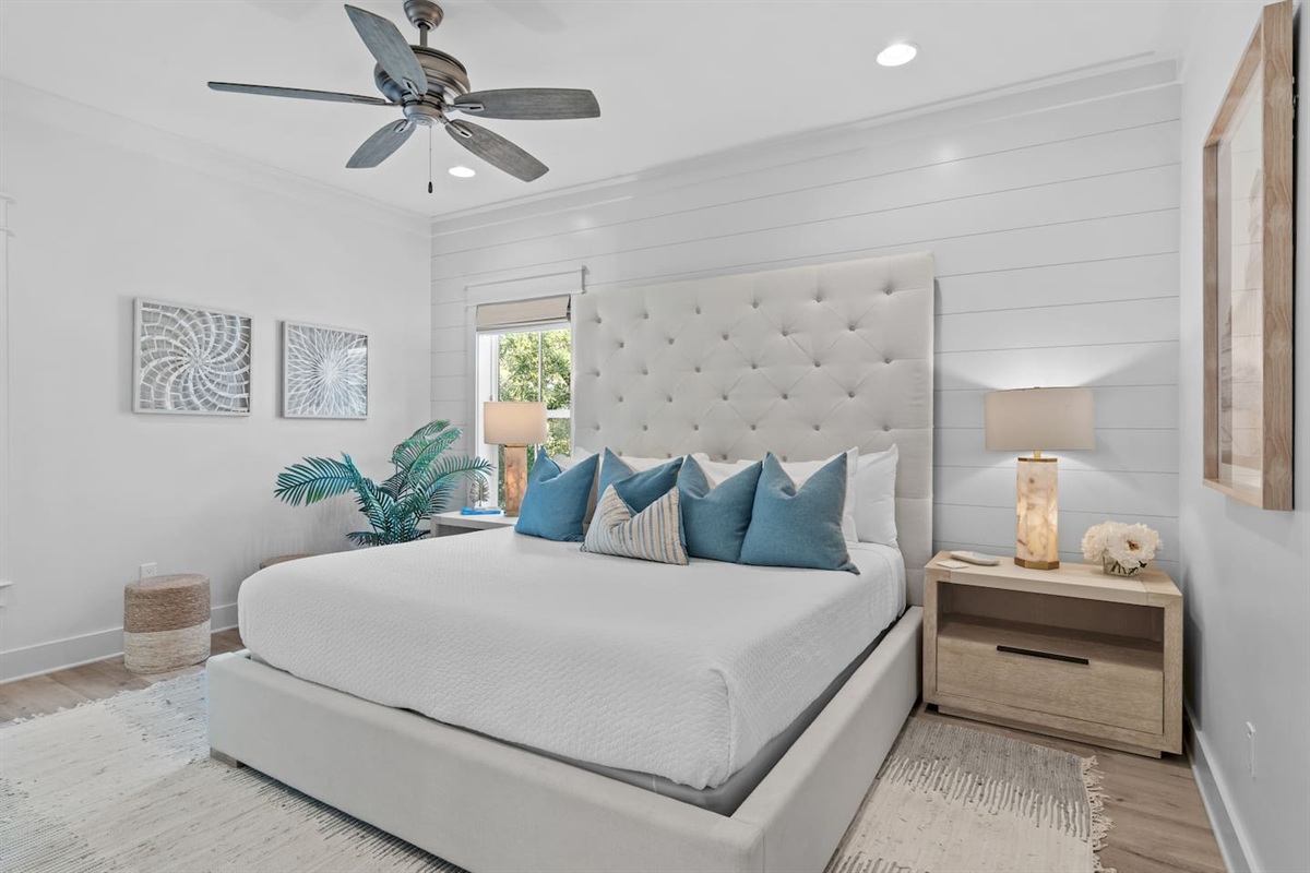 Spacious 2nd level king bedroom suite with full ensuite bathroom, tiled shower, dual vanity sinks, and newly remodeled outdoor shower.