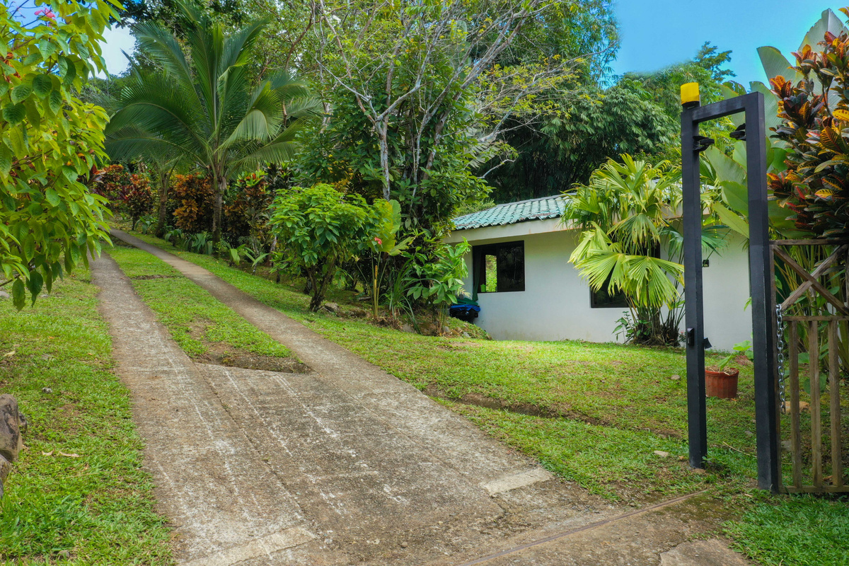 Private gated entrance to Casa Infinity through the Hills of Portalón