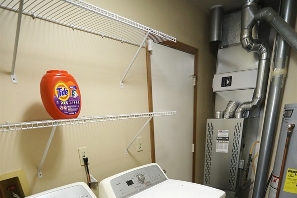 Laundry room top loaded washer and front loaded dryerdryer