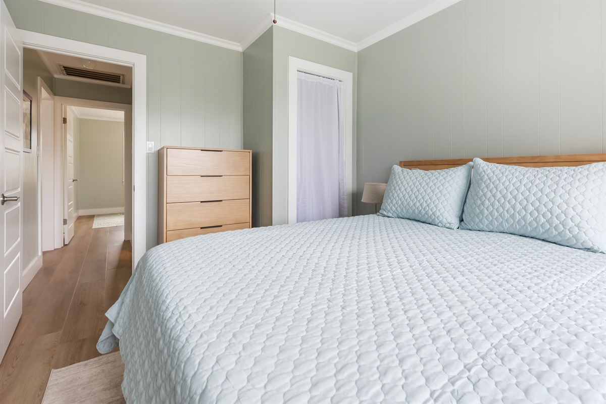 Queen bed with plenty of space in the dresser and closet!