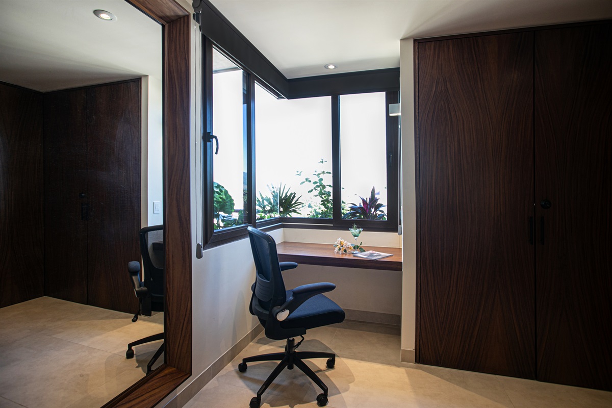 You have a dedicated workspace in the main bedroom.