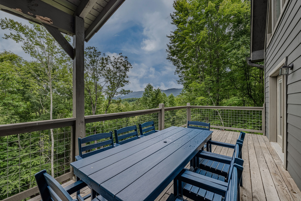 Blue Smoke Outlook offers covered outdoor space with peaceful wooded views.