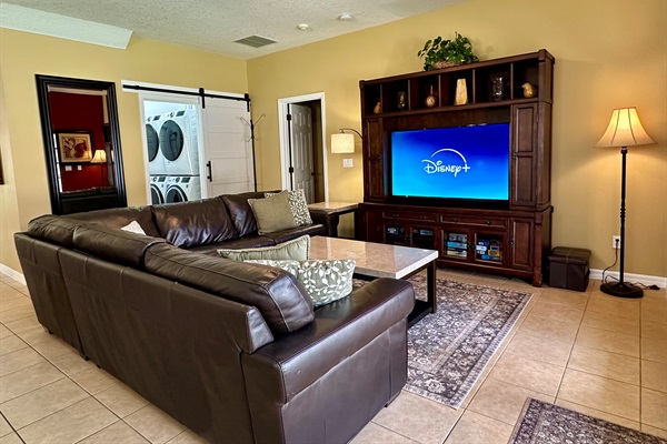Living Area with Laundry Area and Downstairs King Bedroom ensuite access