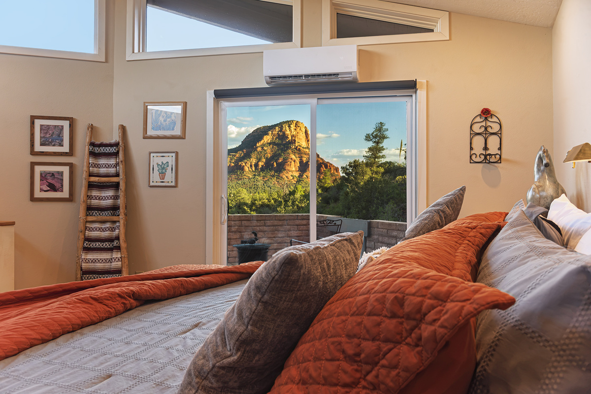 Imagine a luxurious King bed and nature's beauty all in one.