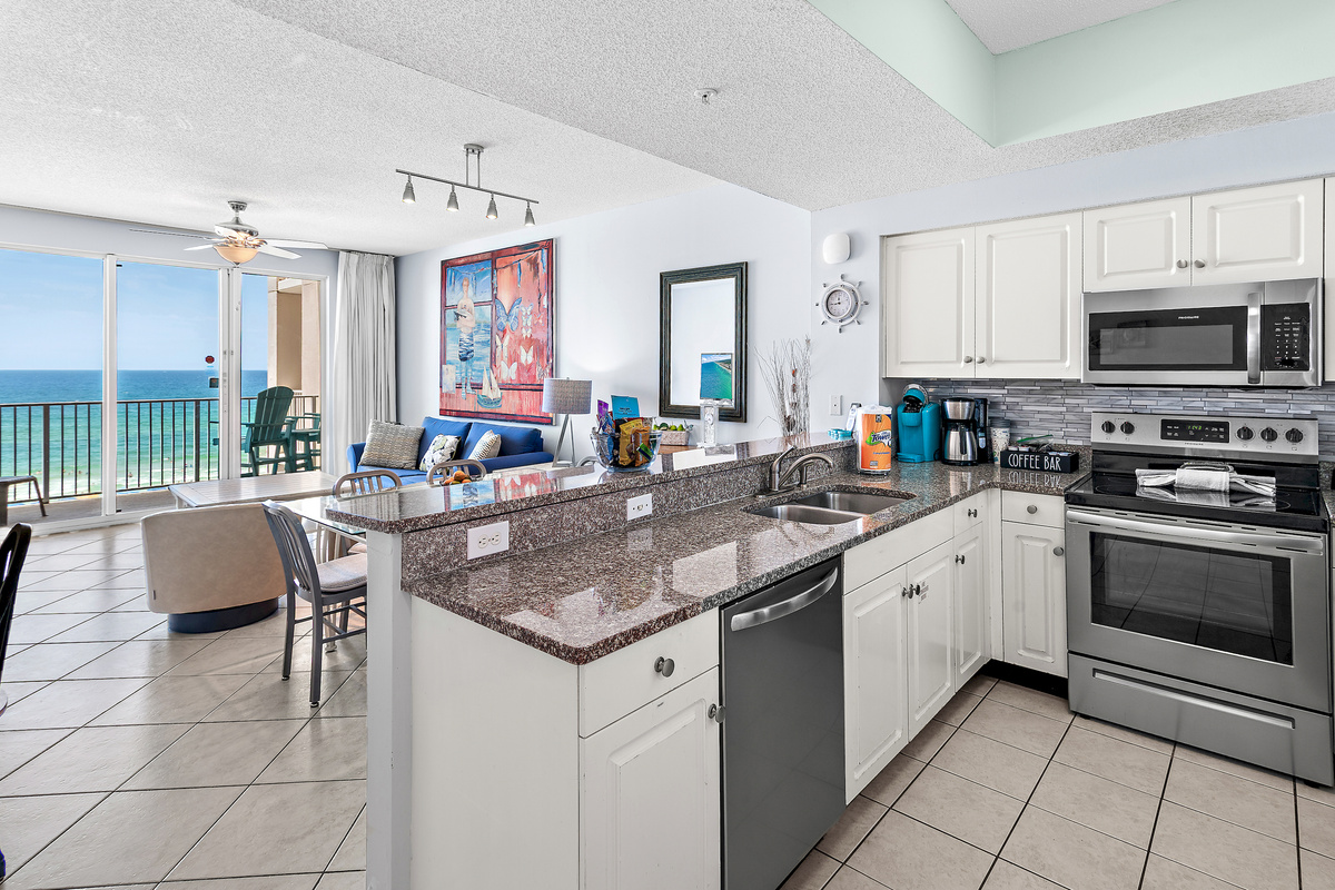 Kitchen has GULF VIEWS, granite countertops, stainless appliances - fully stocked with more than the basics (coffee/tea bar, oils/salt and pepper, plenty of pots/pans/cookware)