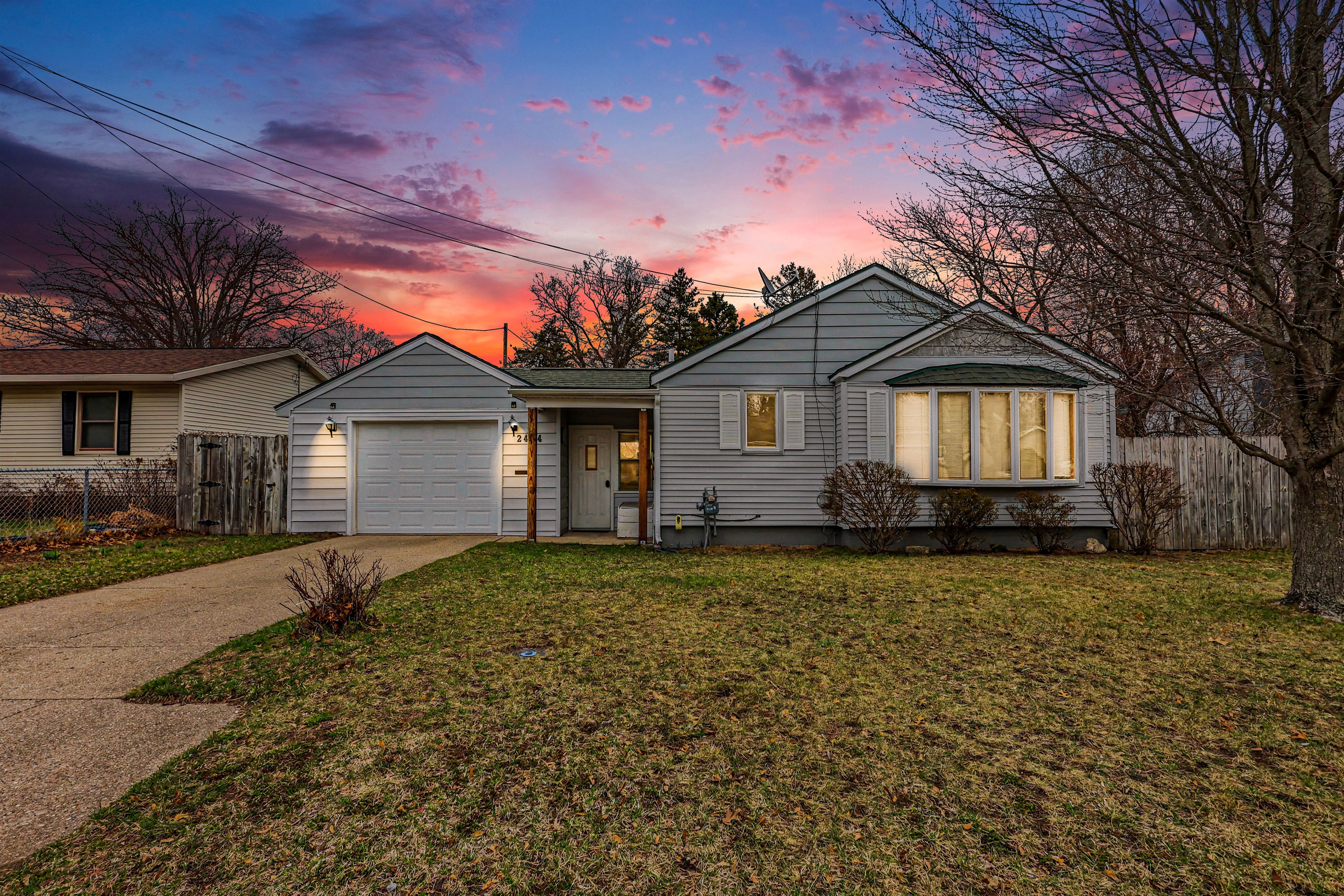 Front of the home, drive way.