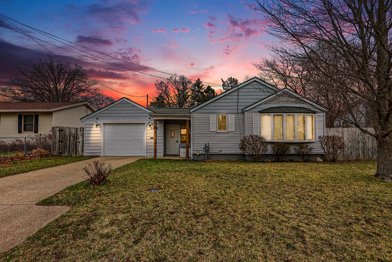 Front of the home, drive way.