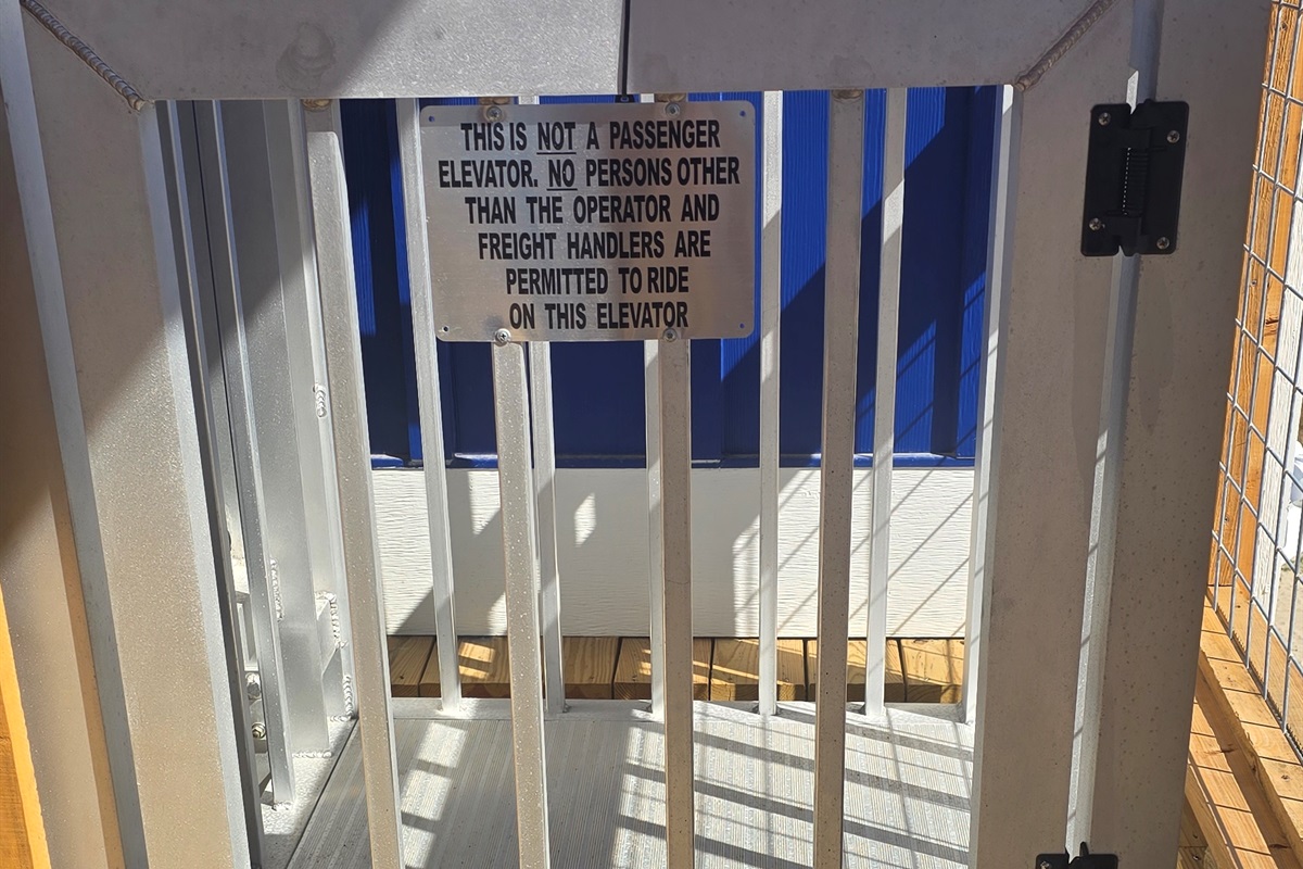 Lift from deck safety gate open