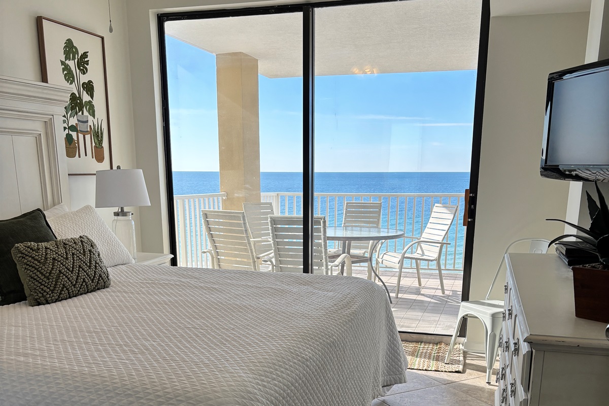 King bedroom with Gulf views and direct balcony access.