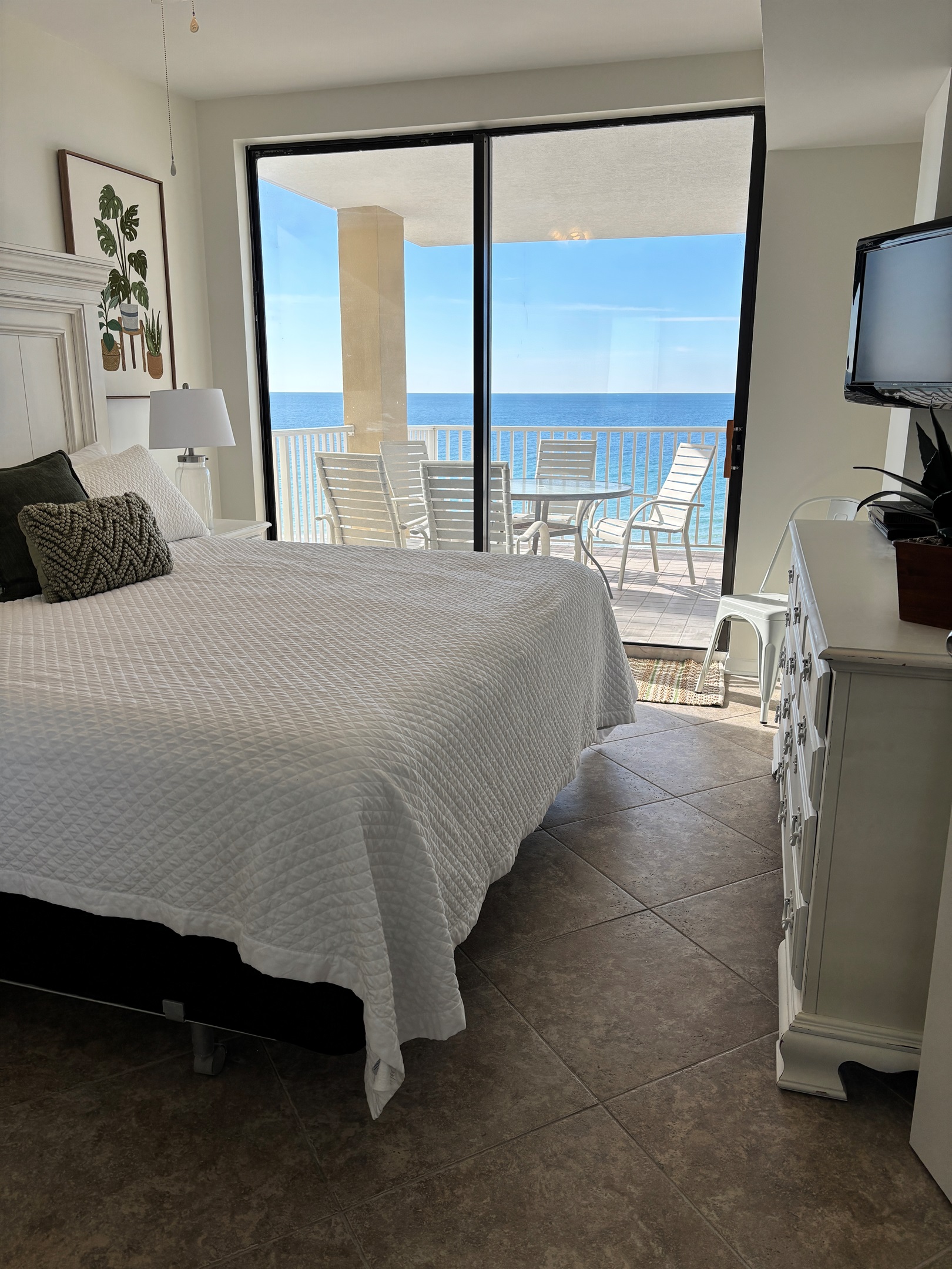 King bedroom with Gulf views and direct balcony access.