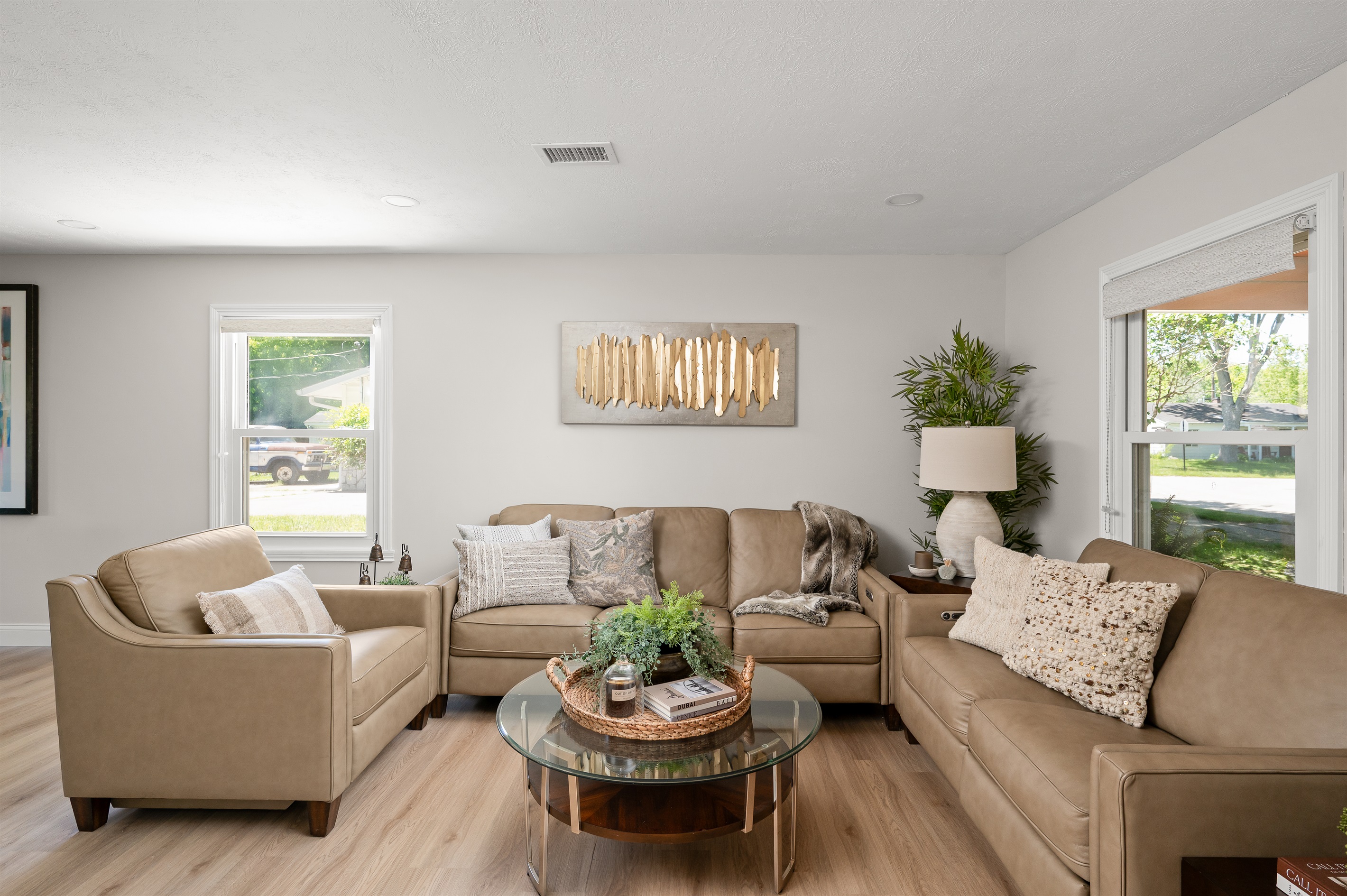 Spacious living room with comfortable seating for 6 to 8 guests, perfect for movie nights, game nights, or simply relaxing together after a day out.