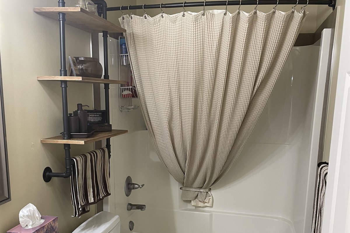 Guest bathroom in between bedrooms.