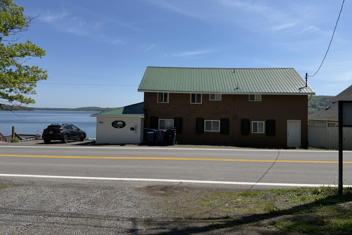 The Lakehouse Retreat with parking for 1 small car to the left