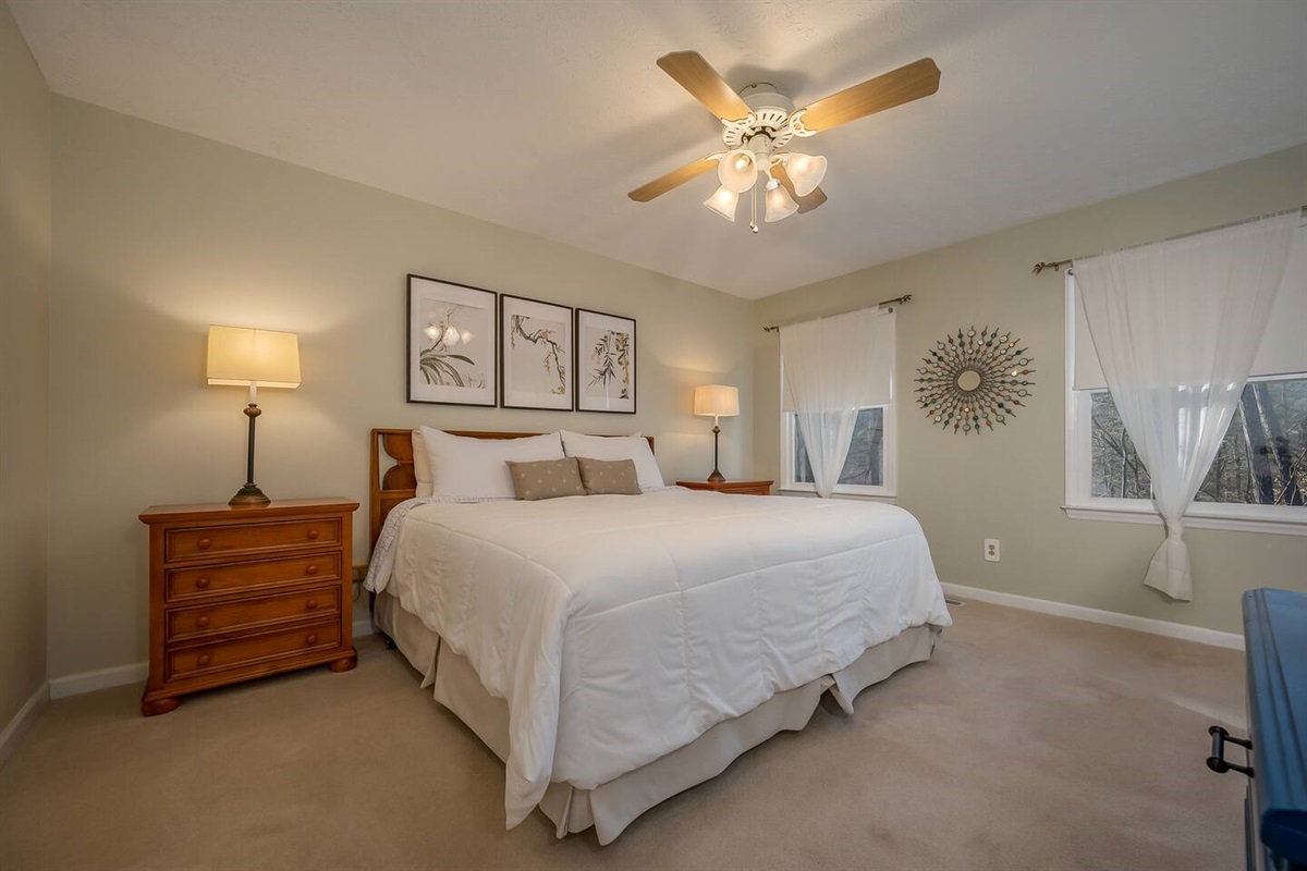 Primary bedroom with king bed and private full bath