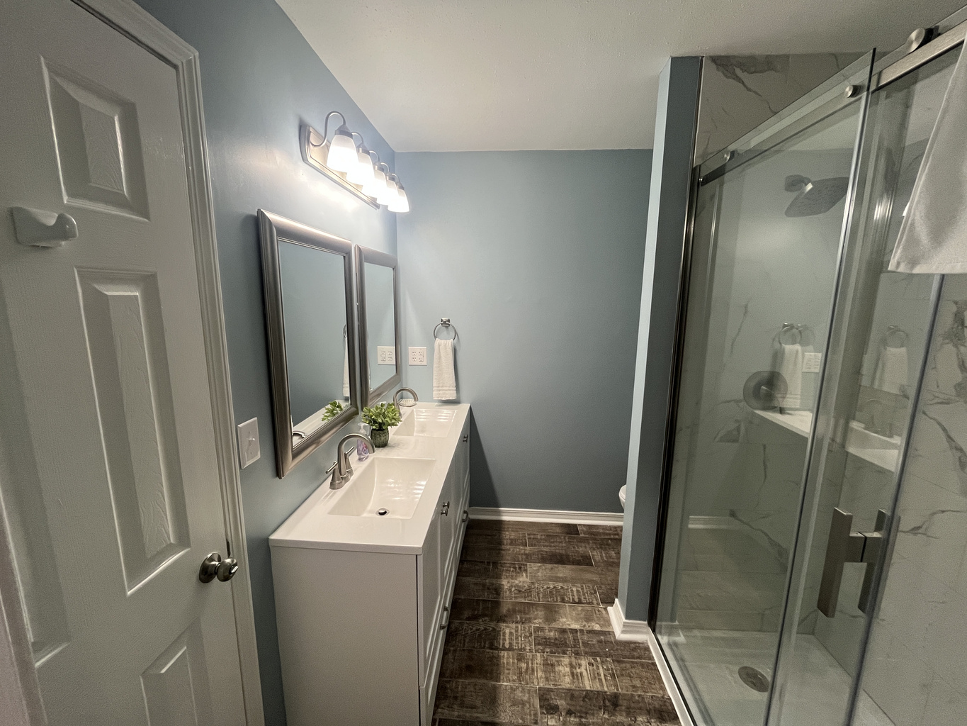 Master bath. Double vanity with walk-in shower. 