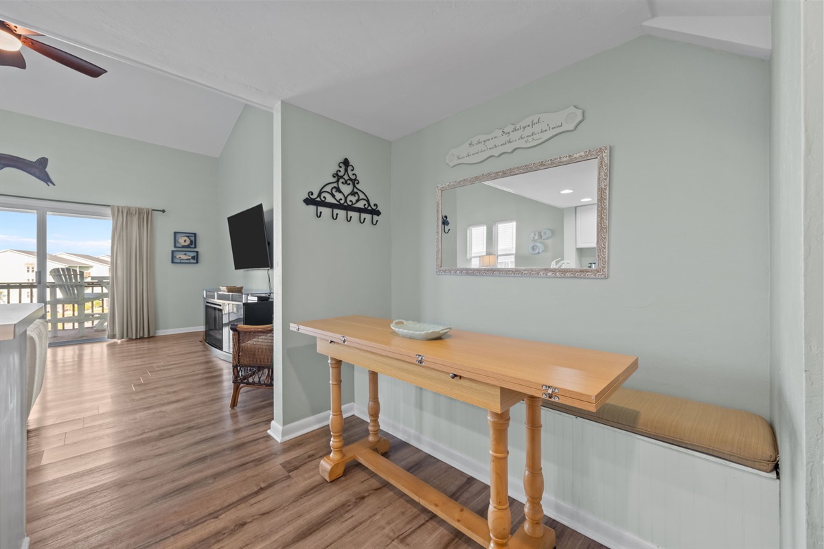 Entry nook with drop-leaf table perfect for quick meals or workspace