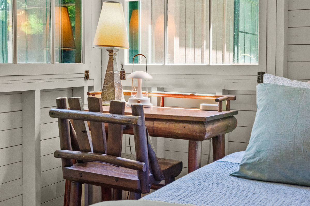 Need to check in with work? A dedicated desk in the main-level bedroom gives you a quiet, comfortable spot to stay connected before getting back to enjoying the lake.