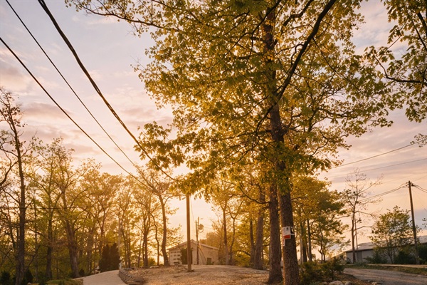 Parking area on the gravel above the retaining wall