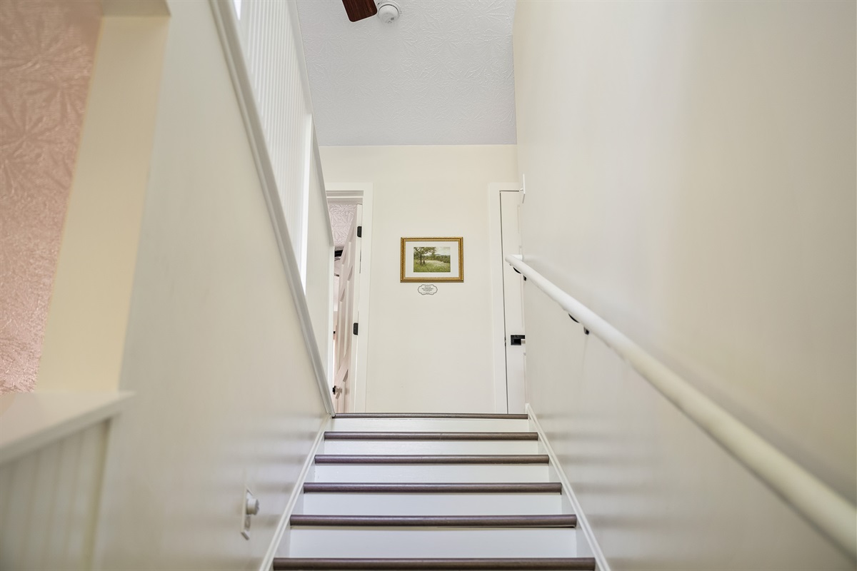 Stairs leading to Upstairs Bedroom and Bathroom