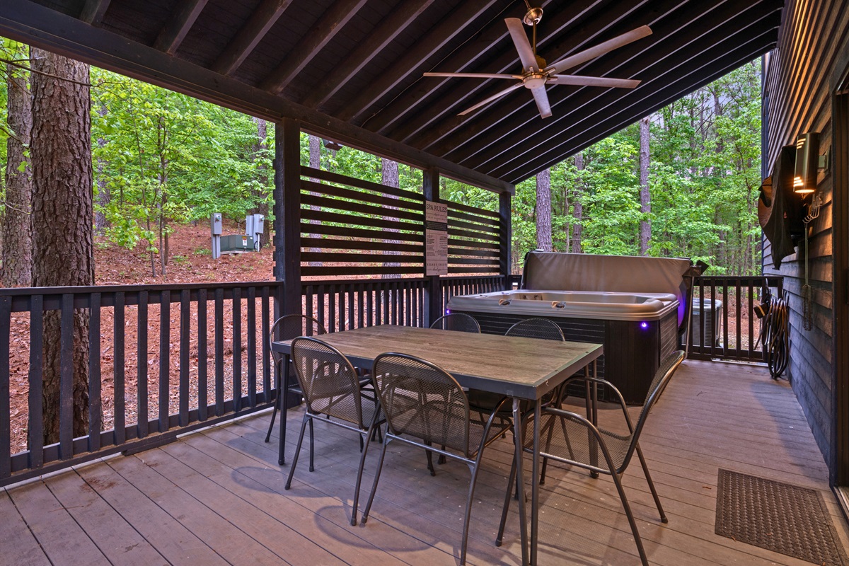 The covered deck offers a quiet place to sit back and enjoy the fresh air, whether it’s morning or evening.