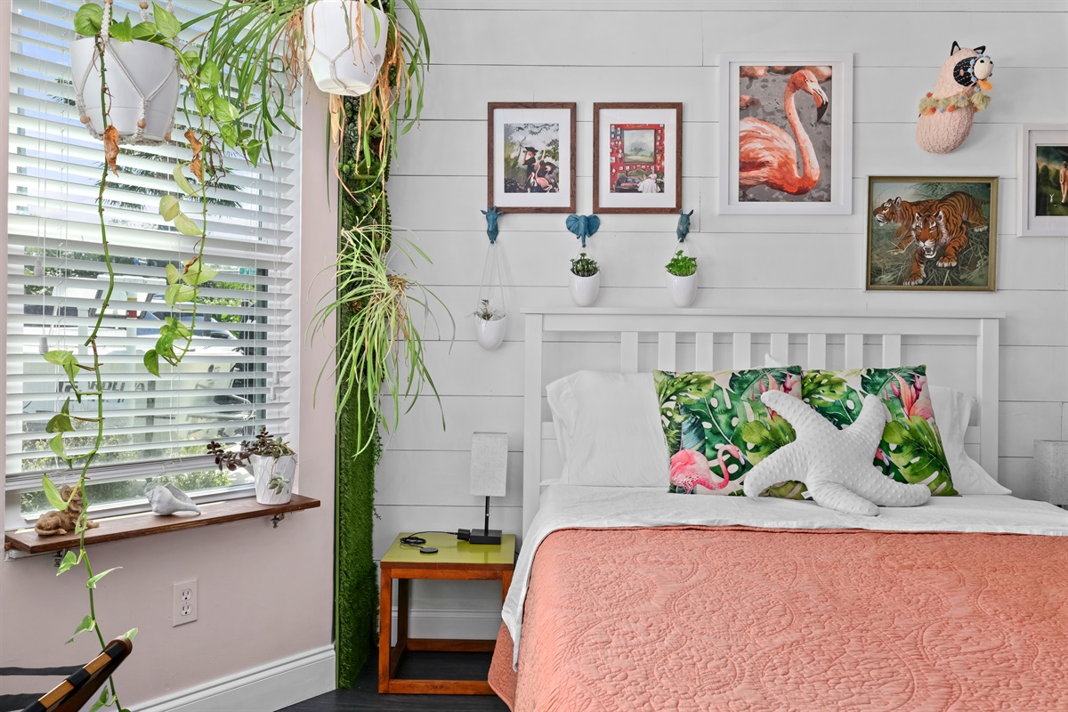 This guest room is bright and has comfy bedding.