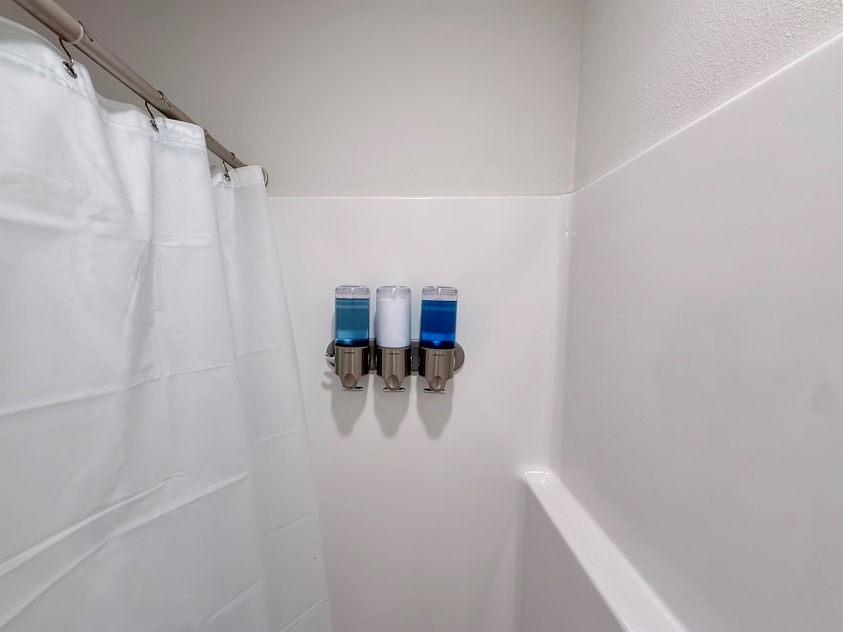 Secondary bathroom with tub/shower combo. Select toiletries provided