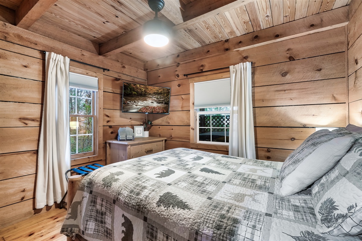 Wake up surrounded by pine walls and natural light