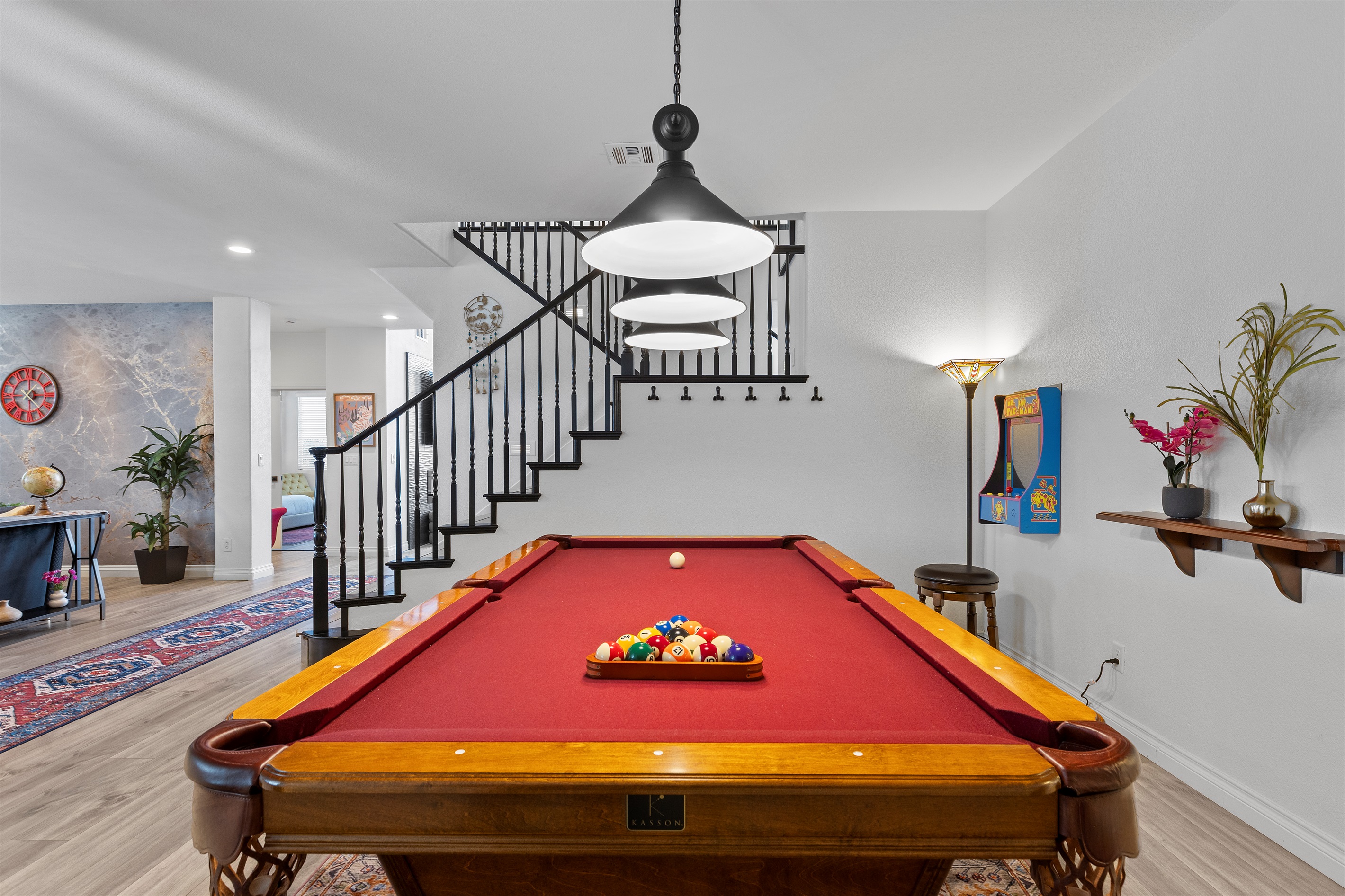 Awesome indoor game room with a slate pool table and 2 arcade machines, Ms. PacMan and Legends Ultimate Mini with thousands of games.  All are free to play.  It's Showtime!