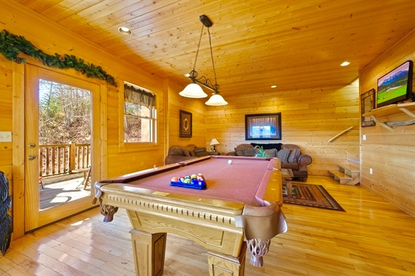 Gather around the game room and play a round of pool with family and friends.