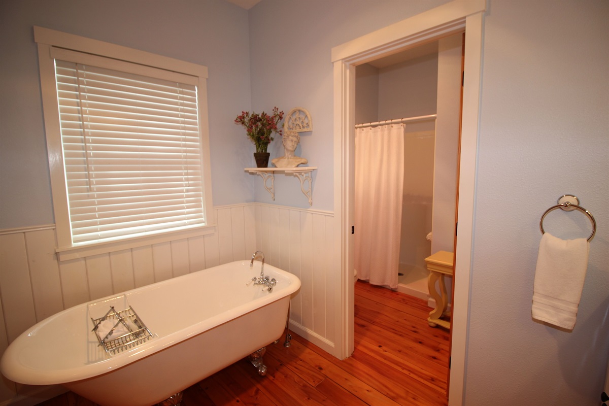The clawfoot bathtub adds timeless charm and comfort to your stay.