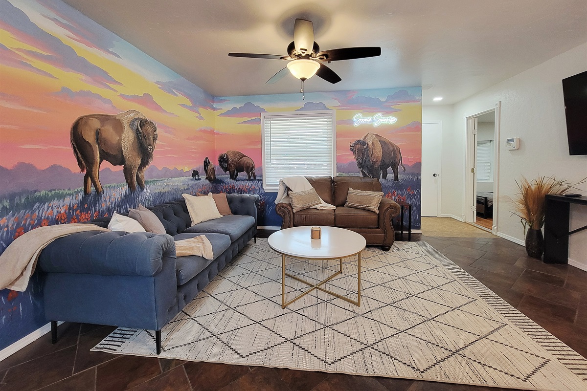 Our beautiful living room mural painted by a talented local artist