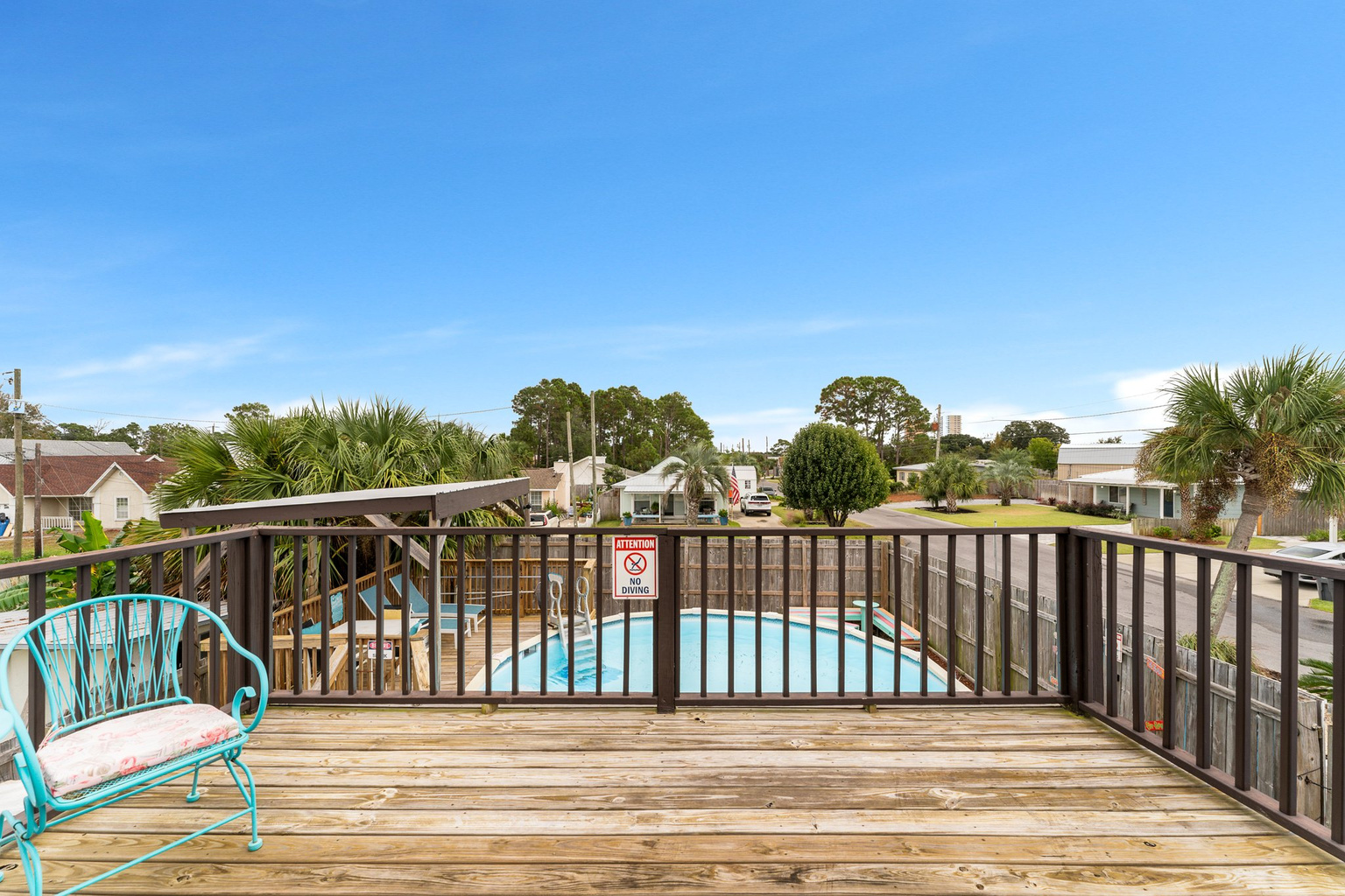 Pool deck from above — full pergola view