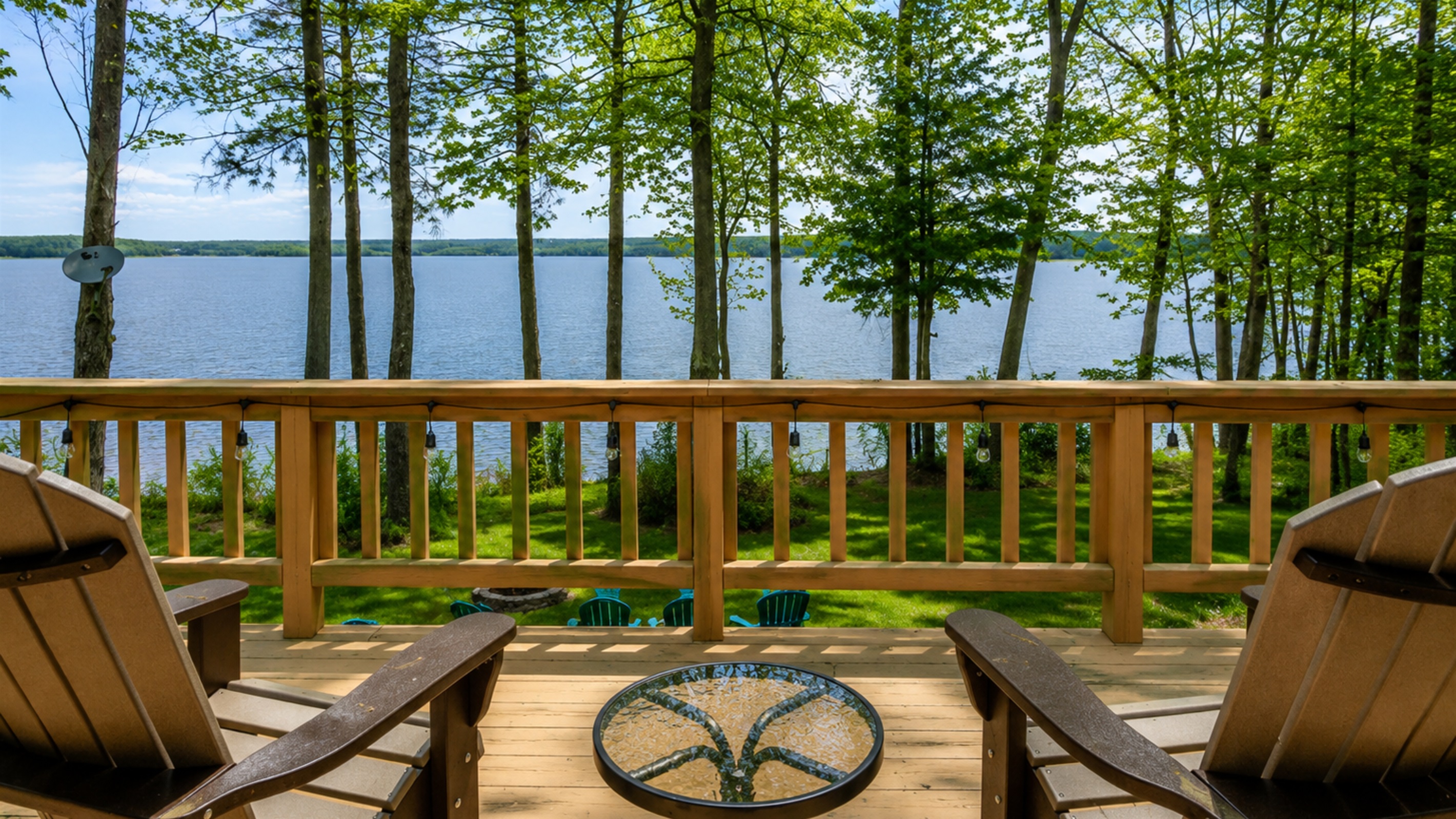 Sip your morning coffee or evening wine from these cozy chairs overlooking serene lakefront views. ☕🌲