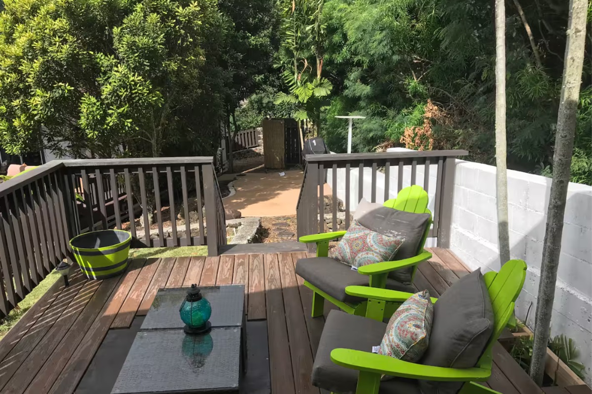 Private Deck from Suite with mountain views. Pic shows the barbecue area and outdoor shower