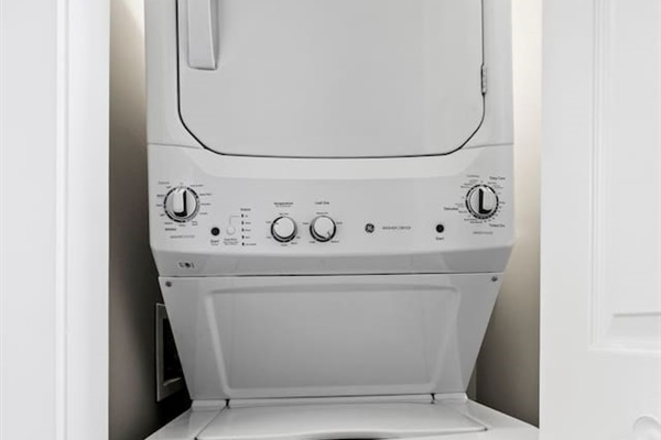 A convenient stackable washer and dryer, perfect for saving space while handling laundry needs.