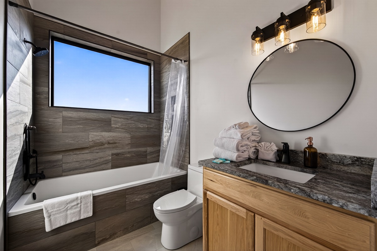 This bathroom features vaulted ceilings & beautiful Smoky Mountain views. Relax in the XL 72 inch soaking tub. Or the kids a bath! 